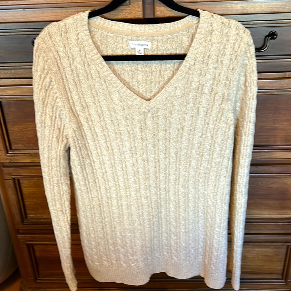 Pretty taupe color sweater size m very nice design in the sweater,